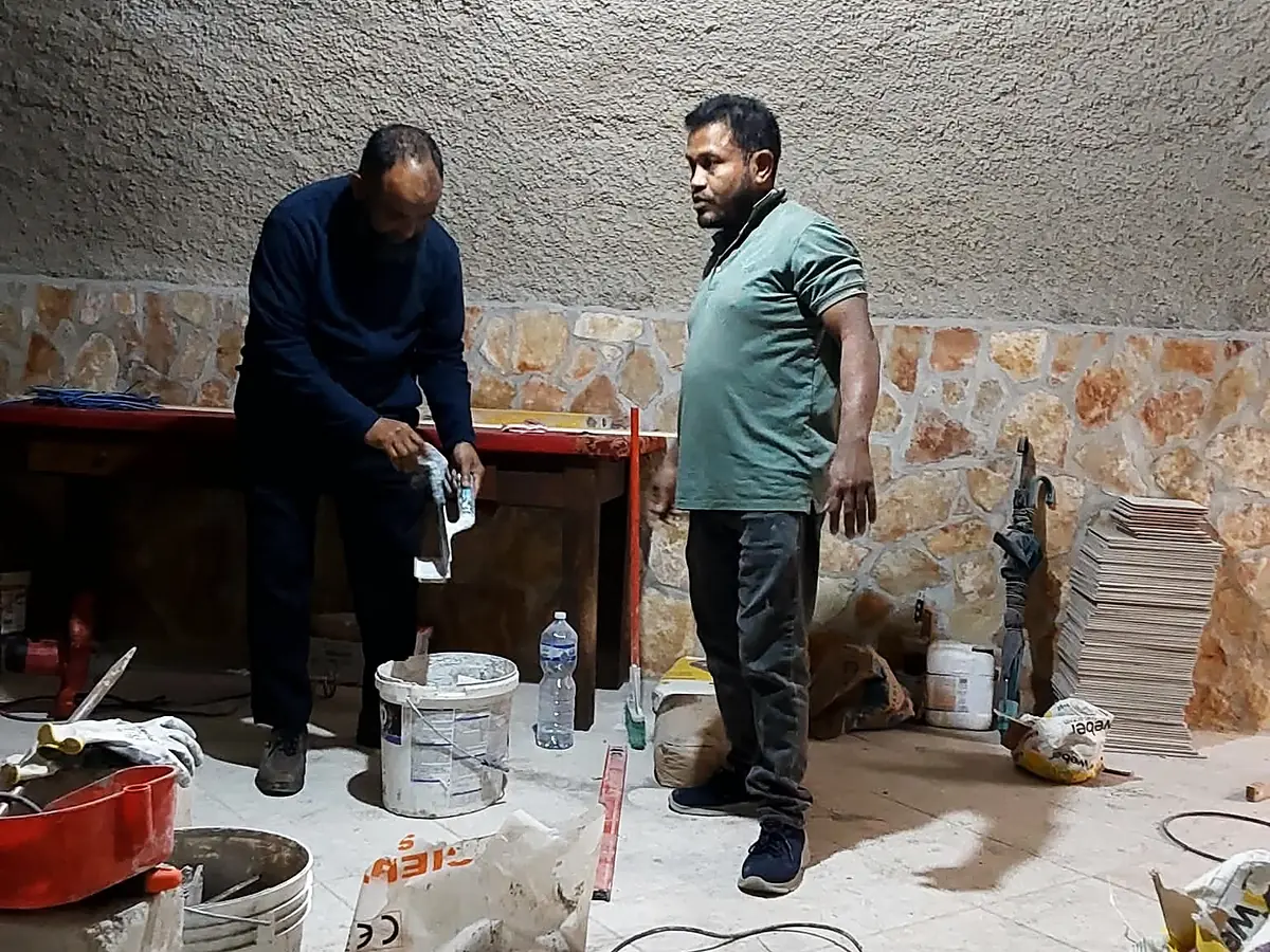 La squadra di Società Costruzione Edile in cantiere